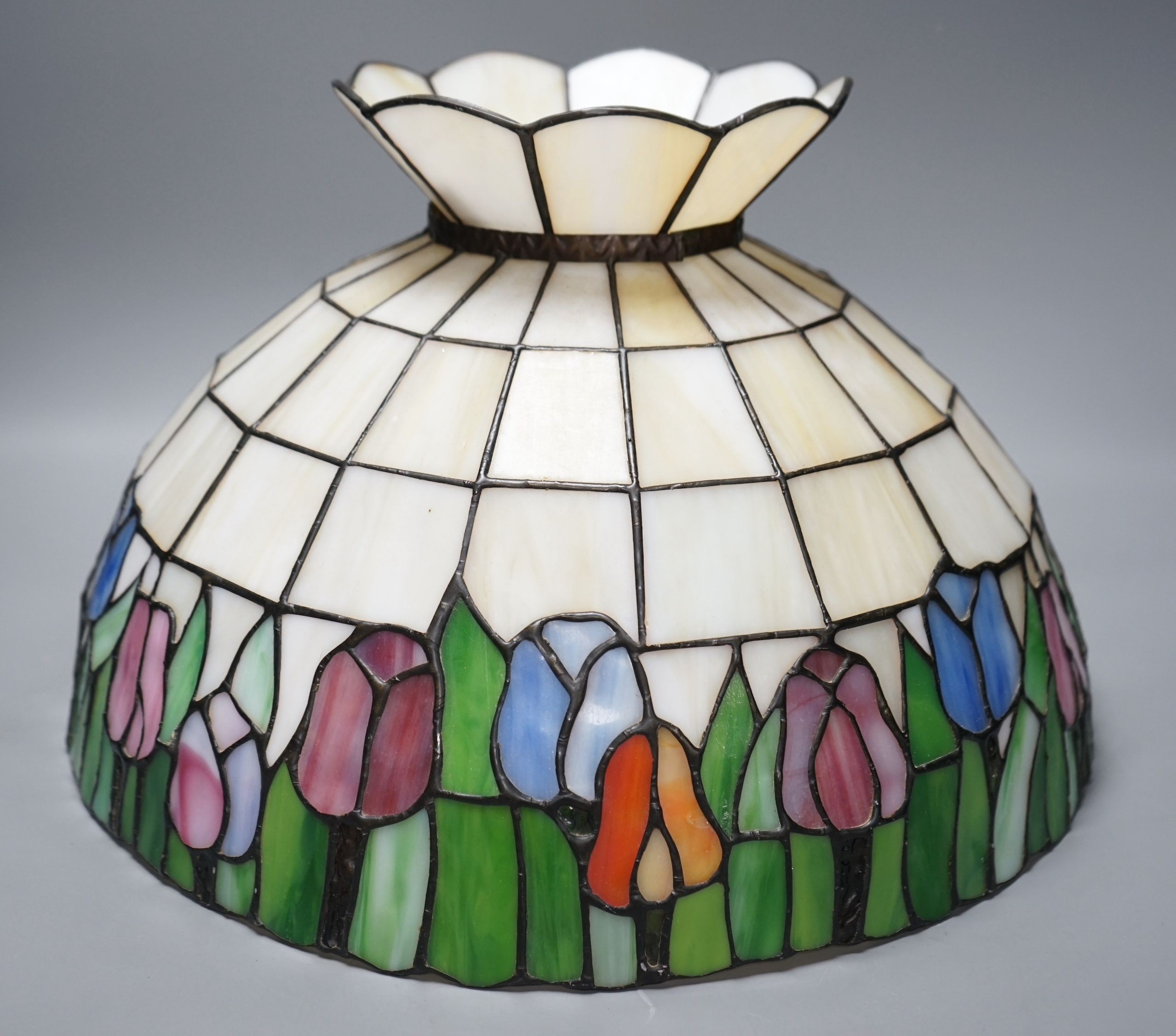 A large Tiffany style glass ceiling shade, 28cms high